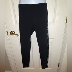Women’s athletic Guess racer stripe leggings. NWT